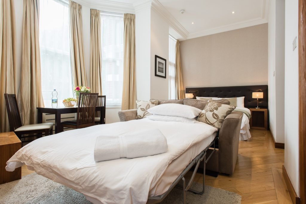 Deluxe Studio sofa bed made up for a guest